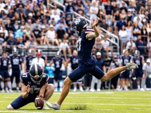 Colorado School of Mines football players at a game at Marv Kay Stadium in Golden, CO