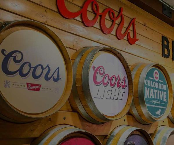 A wall display of Coors barrels