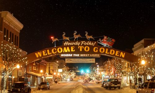 Welcome Arch Downtown Golden Washington Ave. with winter holiday lights and decorations